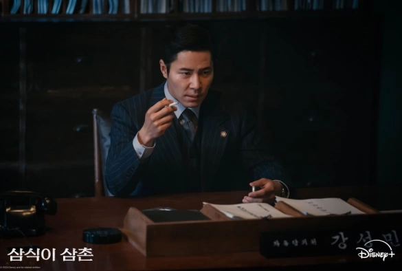 Кадр из дорамы Дядя Сам Сик