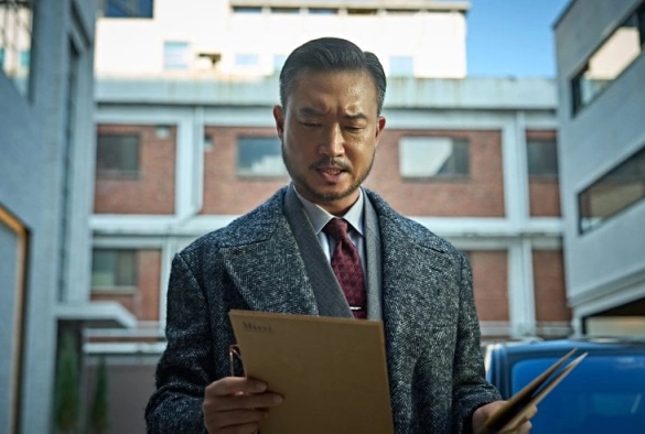 Кадр из дорамы Богомол