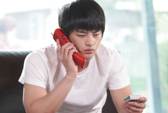 Кадр из дорамы Ответ в 1997